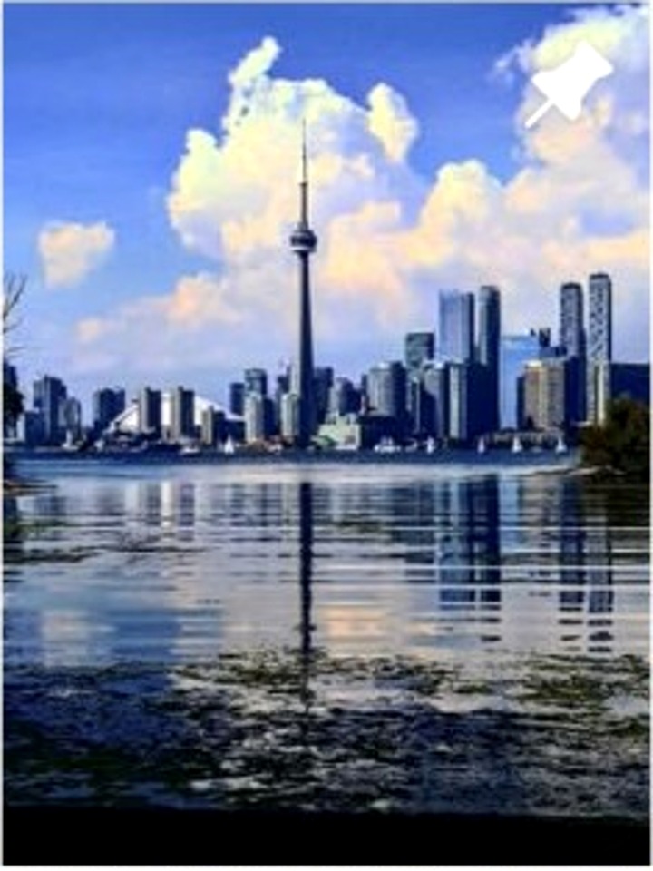 Skyline reflected on water